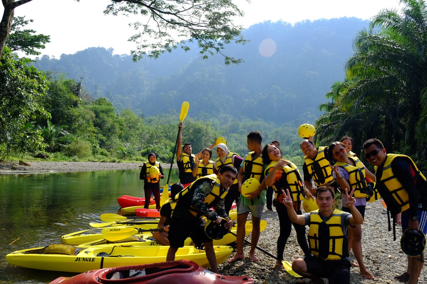 A happy group of paddlers at the riverside before launch