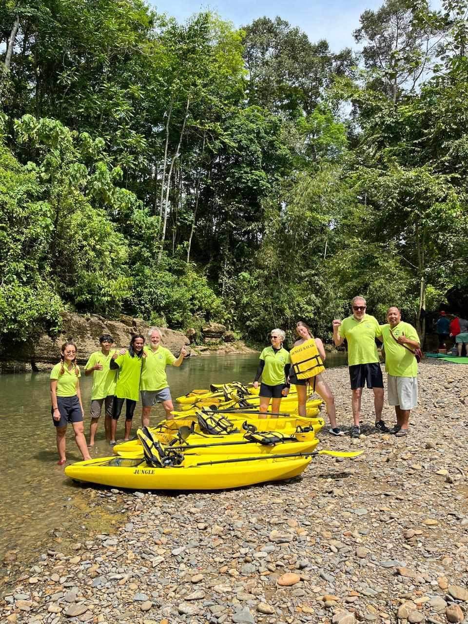 The Jungle Kayak team in their bright green shirts ready for a trip